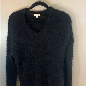 black fluffy sweater